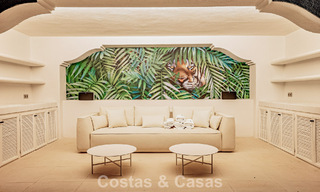 Boutique villa in resortstijl te koop met open zeezicht, genesteld in het weelderig groen van het exclusieve La Zagaleta golfresort, Marbella - Benahavis 54051 