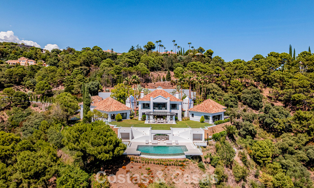 Boutique villa in resortstijl te koop met open zeezicht, genesteld in het weelderig groen van het exclusieve La Zagaleta golfresort, Marbella - Benahavis 54053