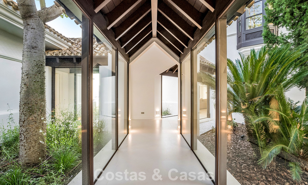 Boutique villa in resortstijl te koop met open zeezicht, genesteld in het weelderig groen van het exclusieve La Zagaleta golfresort, Marbella - Benahavis 54085