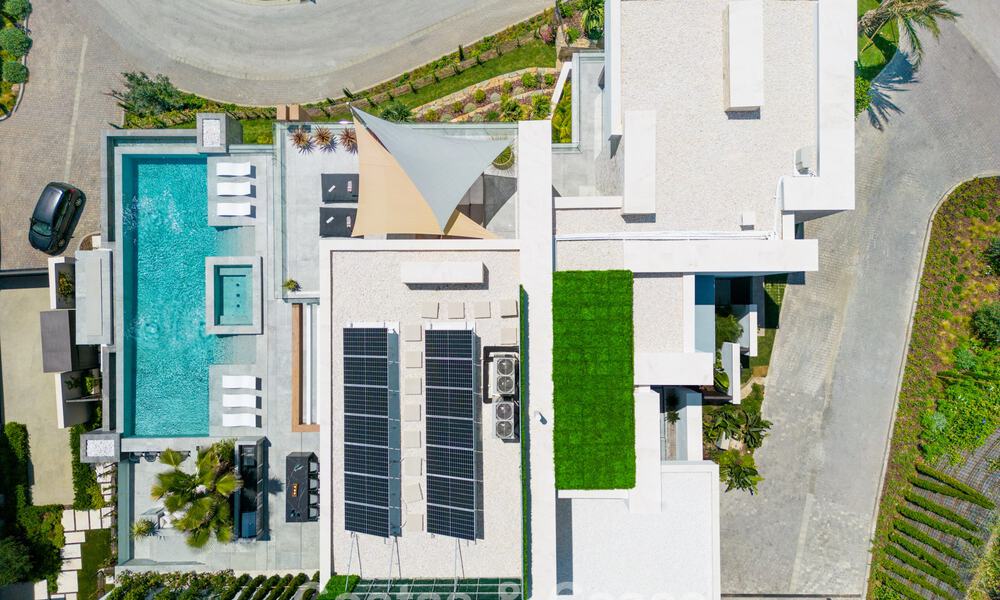Verbluffende, architecturale luxevilla te koop met open zeezicht in een hoogstaande gated woonwijk in de heuvels van La Quinta in Marbella - Benahavis 54121