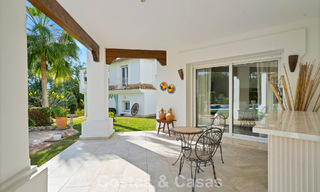 Statige luxe mansion in Andalusische stijl met zeezicht in de golfvallei van Nueva Andalucia, Marbella 779200 