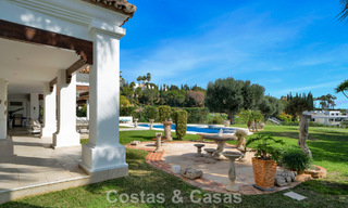 Statige luxe mansion in Andalusische stijl met zeezicht in de golfvallei van Nueva Andalucia, Marbella 779214 