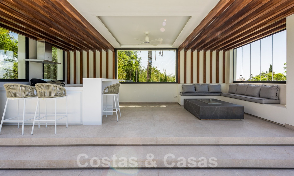 Nieuwe, modernistische designervilla te koop met uitzicht op de golfbaan in een golfresort, Marbella - Benahavis 55512