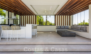 Nieuwe, modernistische designervilla te koop met uitzicht op de golfbaan in een golfresort, Marbella - Benahavis 55512 