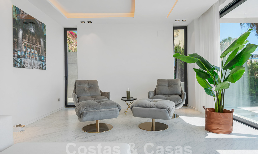 Nieuwe, modernistische designervilla te koop met prachtig zeezicht in vijfsterren golfresort te Marbella - Benahavis 55872