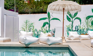 Sfeervolle luxevilla in Ibiza-stijl te koop, dicht bij alle voorzieningen van Nueva Andalucia, Marbella 56912 