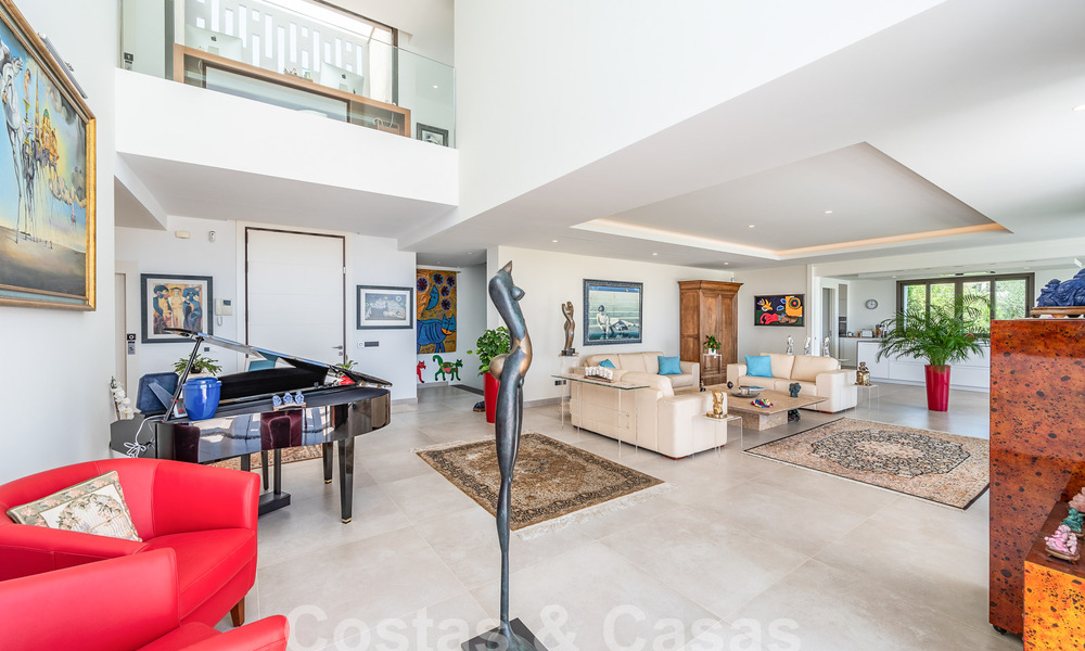 Moderne luxevilla te koop met zeezicht in een vijfsterren golfresort in Marbella - Benahavis 57611