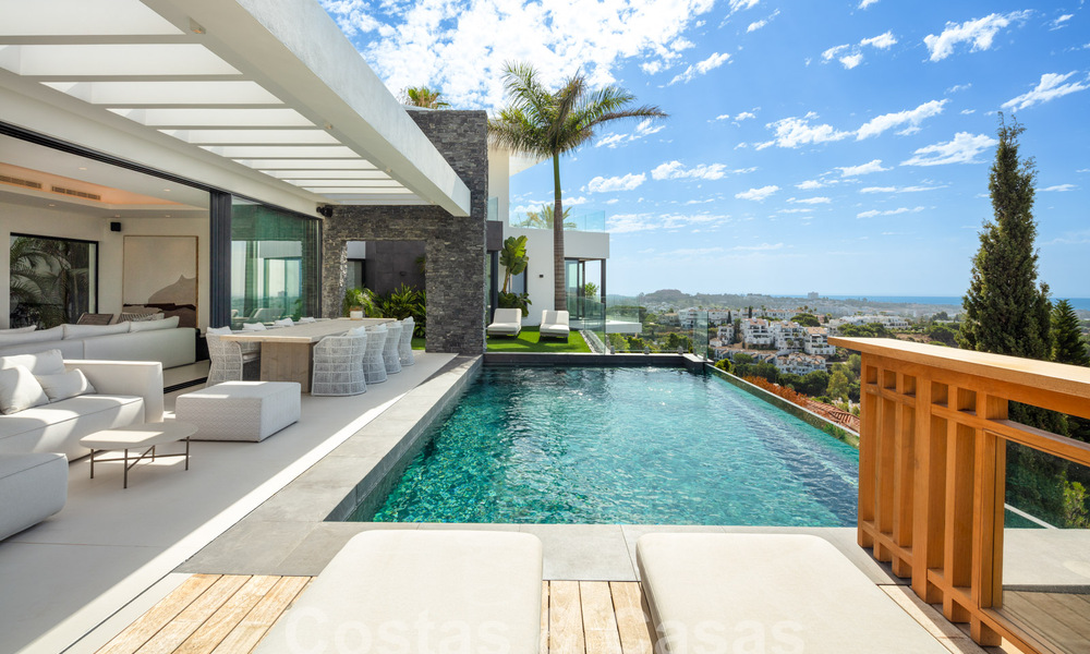 Prestigieuze, moderne luxevilla te koop met adembenemend zeezicht in een gated community in Marbella - Benahavis 58716