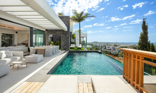 Prestigieuze, moderne luxevilla te koop met adembenemend zeezicht in een gated community in Marbella - Benahavis 58716 