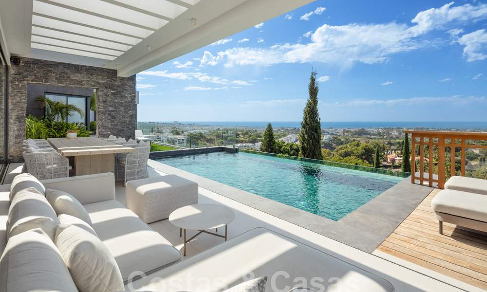 Prestigieuze, moderne luxevilla te koop met adembenemend zeezicht in een gated community in Marbella - Benahavis 58718