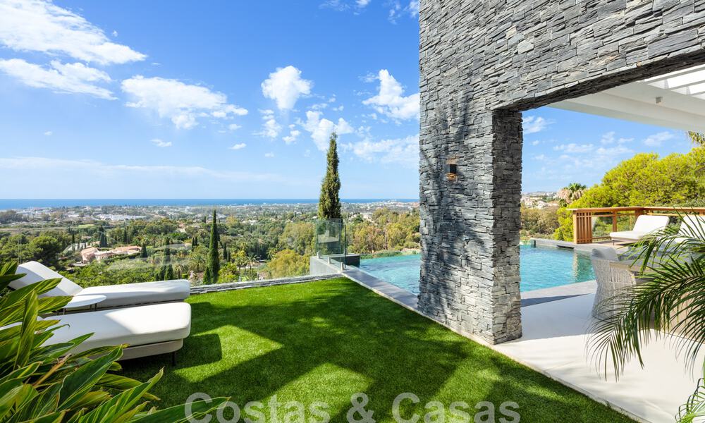 Prestigieuze, moderne luxevilla te koop met adembenemend zeezicht in een gated community in Marbella - Benahavis 58720
