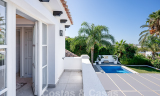 Eigentijdse Andalusische luxevilla te koop in een hoogstaande golfomgeving in Nueva Andalucia, Marbella 59971 