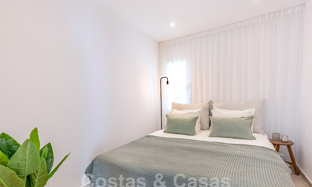 Modern gerenoveerd penthouse te koop met ruim terras en zeezicht in La Quinta golfresort, Benahavis - Marbella 60624