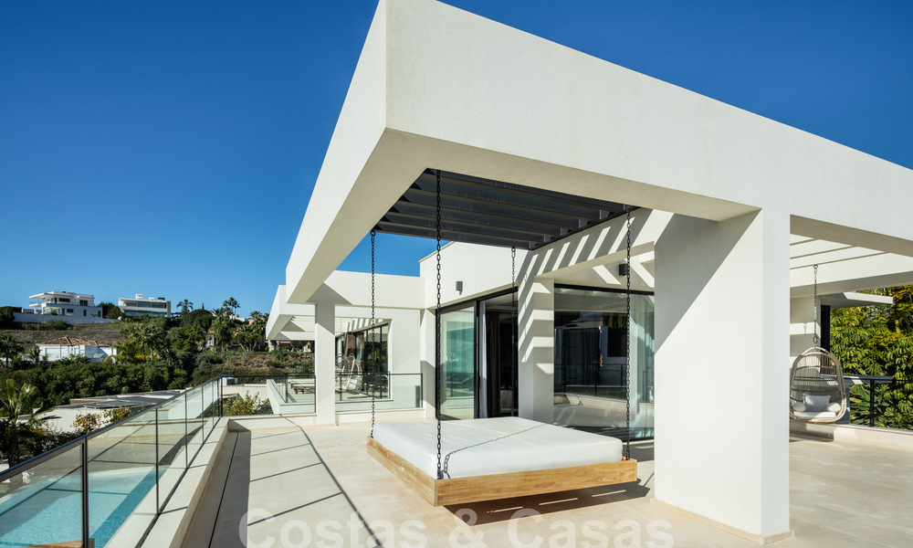 Instapklare, gesofisticeerde luxevilla te koop in Nueva Andalucia’s golfvallei, Marbella 61324