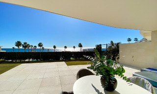Modern tuinappartement te koop met zeezicht in een luxueus strandcomplex op de New Golden Mile, Marbella - Estepona 63417 