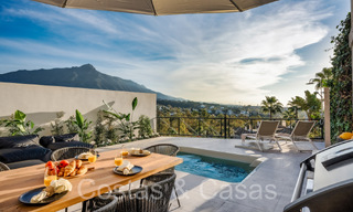 Verfijnd luxe appartement met meer-, berg- en zeezicht te koop in Nueva Andalucia, Marbella 64466 