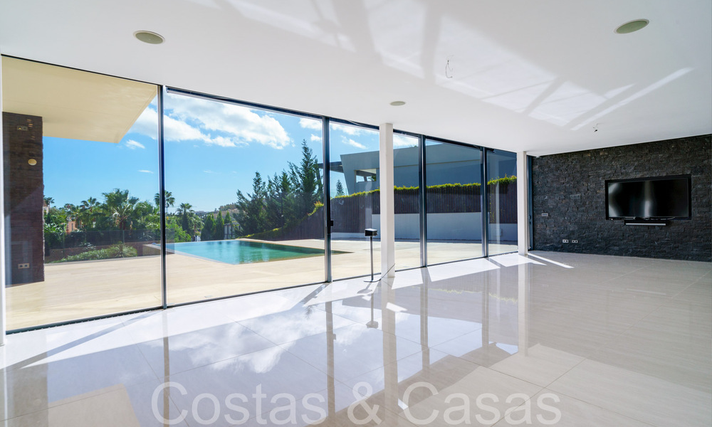 Nieuwe luxevilla met geavanceerde bouwstijl te koop in Nueva Andalucia’s golfvallei, Marbella 64580