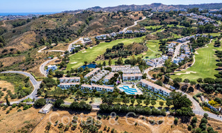 LAATSTE WONING! Nieuw project met moderne luxewoningen te koop grenzend aan de golfbaan in Mijas, Costa del Sol 64609 