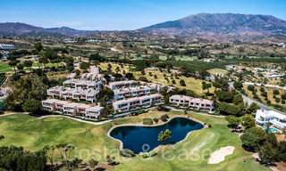 LAATSTE WONING! Nieuw project met moderne luxewoningen te koop grenzend aan de golfbaan in Mijas, Costa del Sol 64610 