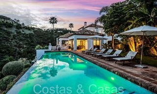 Mediterrane luxevilla te koop met golf- en zeezicht in een gated urbanisatie in La Quinta, Marbella - Benahavis 66706 