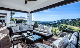 Mediterrane luxevilla te koop met golf- en zeezicht in een gated urbanisatie in La Quinta, Marbella - Benahavis 66707 
