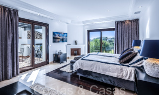 Mediterrane luxevilla te koop met golf- en zeezicht in een gated urbanisatie in La Quinta, Marbella - Benahavis 66718 