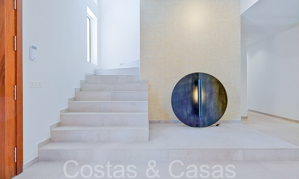 Prachtige gerenoveerde villa in eigentijdse mediterrane stijl te koop, grenzend aan de golfbaan in Benahavis - Marbella 69185