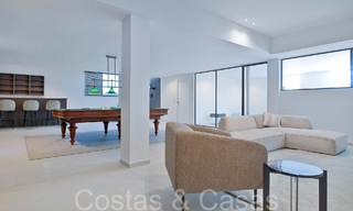 Prachtige gerenoveerde villa in eigentijdse mediterrane stijl te koop, grenzend aan de golfbaan in Benahavis - Marbella 69208 