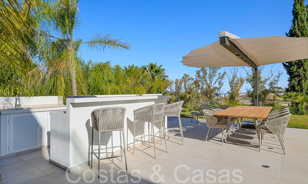 Prachtige gerenoveerde villa in eigentijdse mediterrane stijl te koop, grenzend aan de golfbaan in Benahavis - Marbella 69249