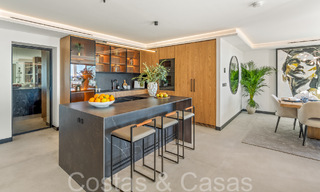 Eersteklas duplex penthouse met panoramisch zeezicht en eigen dompelbad te koop in Nueva Andalucia, Marbella 69466 