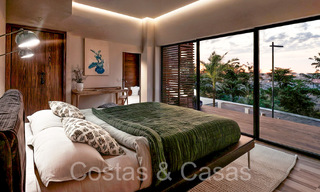 Nieuwe ontwikkeling van townhouses te koop grenzend aan de golfbaan in Estepona 70546 