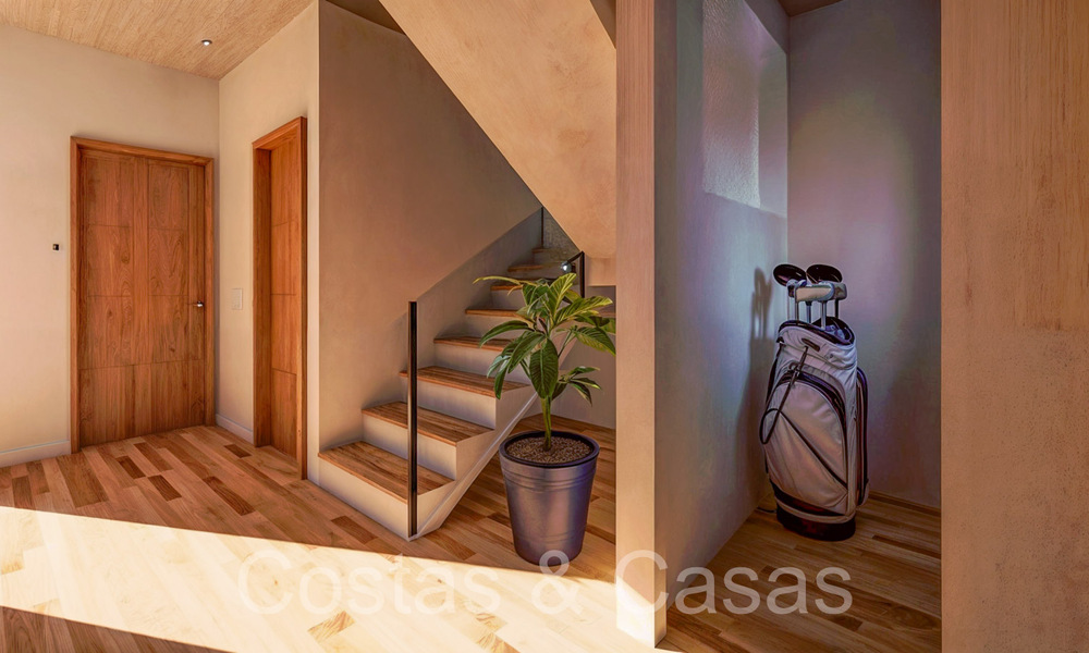 Nieuwe ontwikkeling van townhouses te koop grenzend aan de golfbaan in Estepona 70548