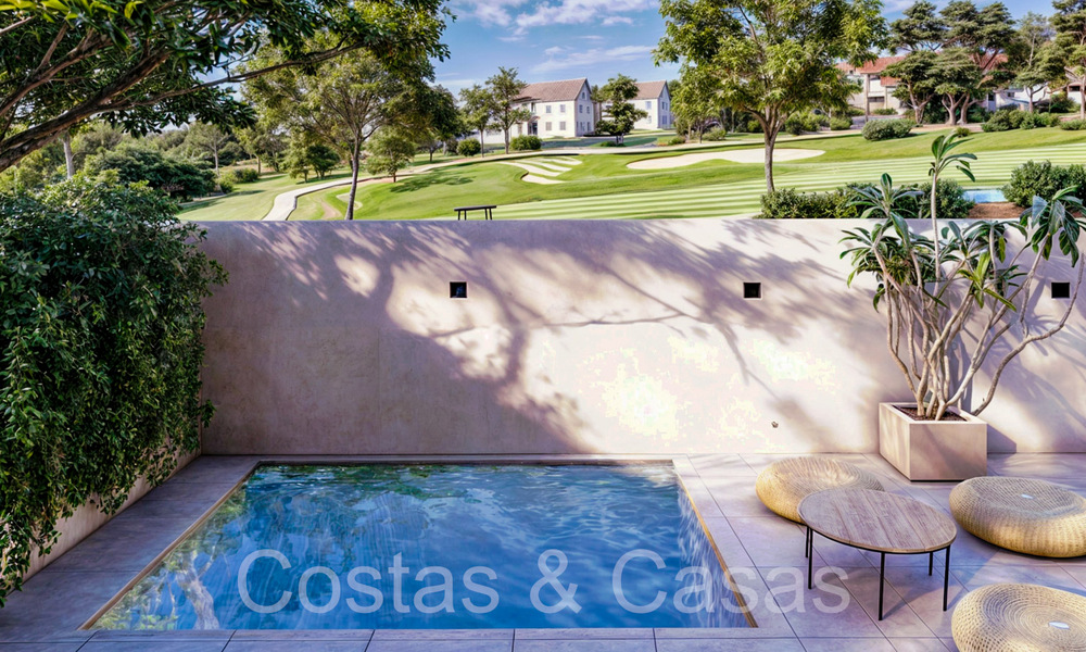 Nieuwe ontwikkeling van townhouses te koop grenzend aan de golfbaan in Estepona 70561