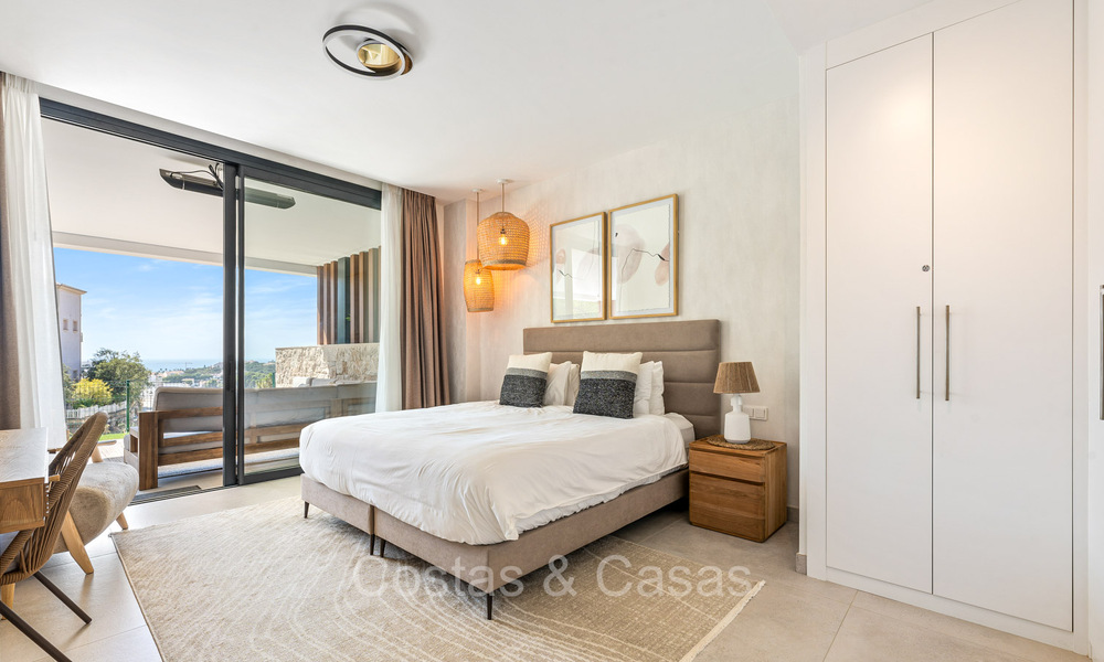 Instapklaar, modern, elegant tuinappartement met privétuin en zeezicht te koop in Oost Marbella 72721