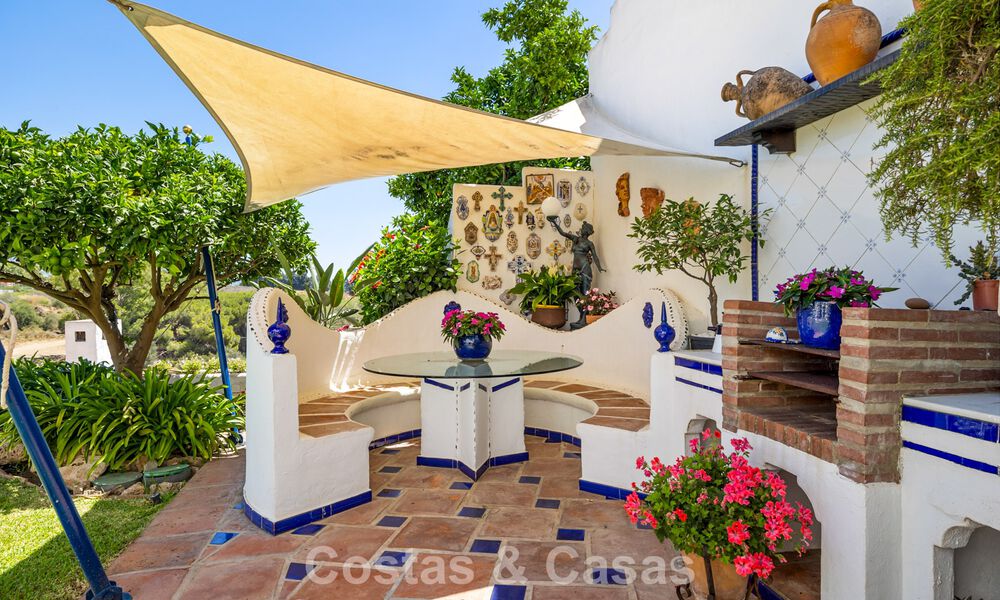 Ruim huis te koop, met uitgestrekte buitenruimtes in een gated complex in Nueva Andalucia, Marbella 74697