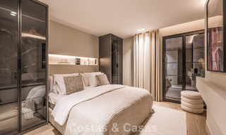 Luxueus gerenoveerd townhouse met zeezicht te koop, in een afgeschermde woonwijk op Marbella’s Golden Mile 774968 