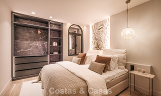 Luxueus gerenoveerd townhouse met zeezicht te koop, in een afgeschermde woonwijk op Marbella’s Golden Mile 774969 