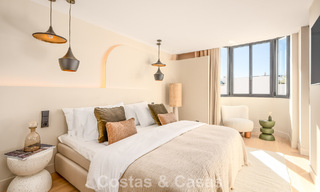 Luxueus gerenoveerd townhouse met zeezicht te koop, in een afgeschermde woonwijk op Marbella’s Golden Mile 774983 