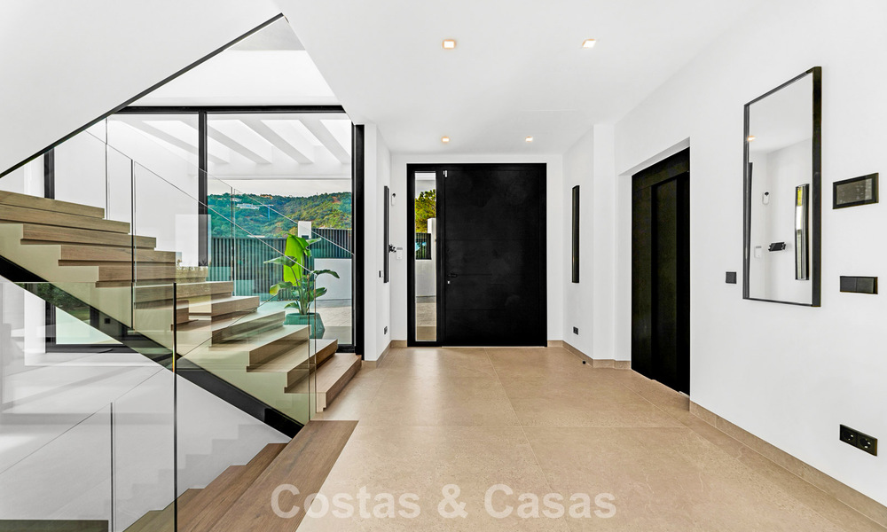 Gesofisticeerde designervilla met magnifiek zeezicht te koop in El Madroñal, Benahavis - Marbella 795624