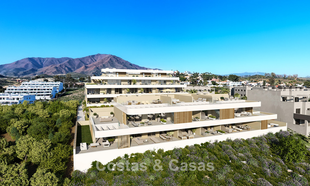 Moderne nieuwbouwappartementen te koop dicht bij het strand en met zeezicht in Estepona West 775320