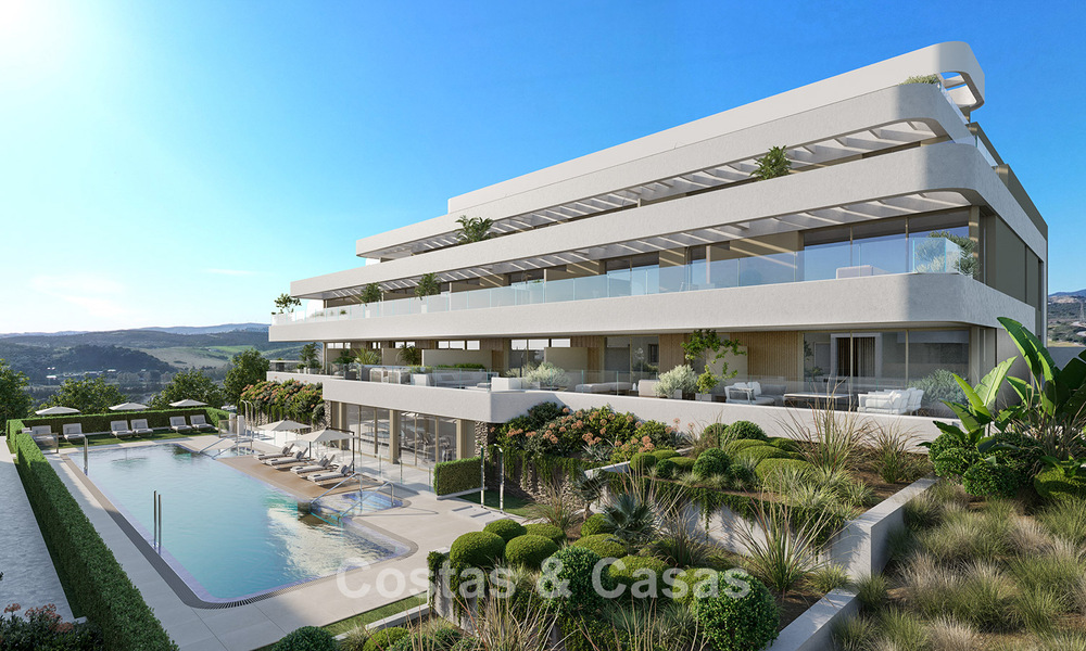 Moderne nieuwbouwappartementen te koop dicht bij het strand en met zeezicht in Estepona West 775323