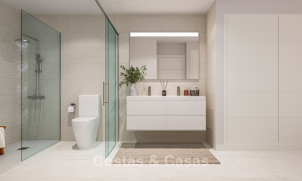 Moderne nieuwbouwappartementen te koop dicht bij het strand en met zeezicht in Estepona West 775329