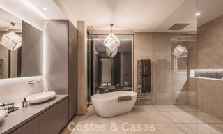 Modernistische luxevilla met zeezicht te koop in de exclusieve en beveiligde omgeving van El Madroñal, Marbella - Benahavis 775887 