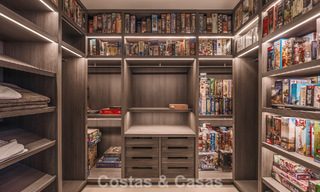 Modernistische luxevilla met zeezicht te koop in de exclusieve en beveiligde omgeving van El Madroñal, Marbella - Benahavis 775899 