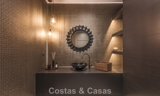 Modernistische luxevilla met zeezicht te koop in de exclusieve en beveiligde omgeving van El Madroñal, Marbella - Benahavis 775901 