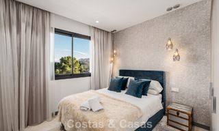 Modernistische luxevilla met zeezicht te koop in de exclusieve en beveiligde omgeving van El Madroñal, Marbella - Benahavis 775905 