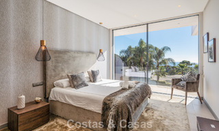 Modernistische luxevilla met zeezicht te koop in de exclusieve en beveiligde omgeving van El Madroñal, Marbella - Benahavis 775914 