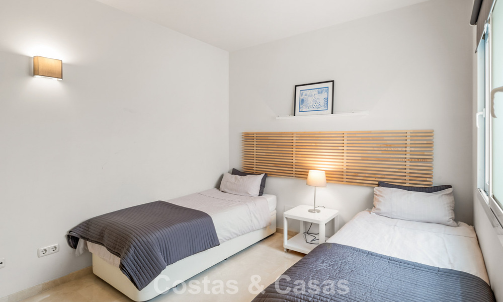 Tuinappartement te koop in een exclusief complex nabij een grote blauwe lagune aan de Costa del Sol 777443