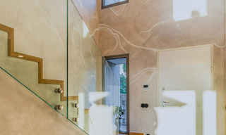 Modernistisch design schakelvilla met zeezicht te koop in een voorstaand resort in Mijas Costa, Costa del Sol 777827 