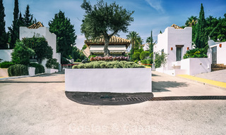 Ruim, instapklaar appartement te koop met grote tuin en zeezicht in een gated community in Benahavis - Marbella 777947 